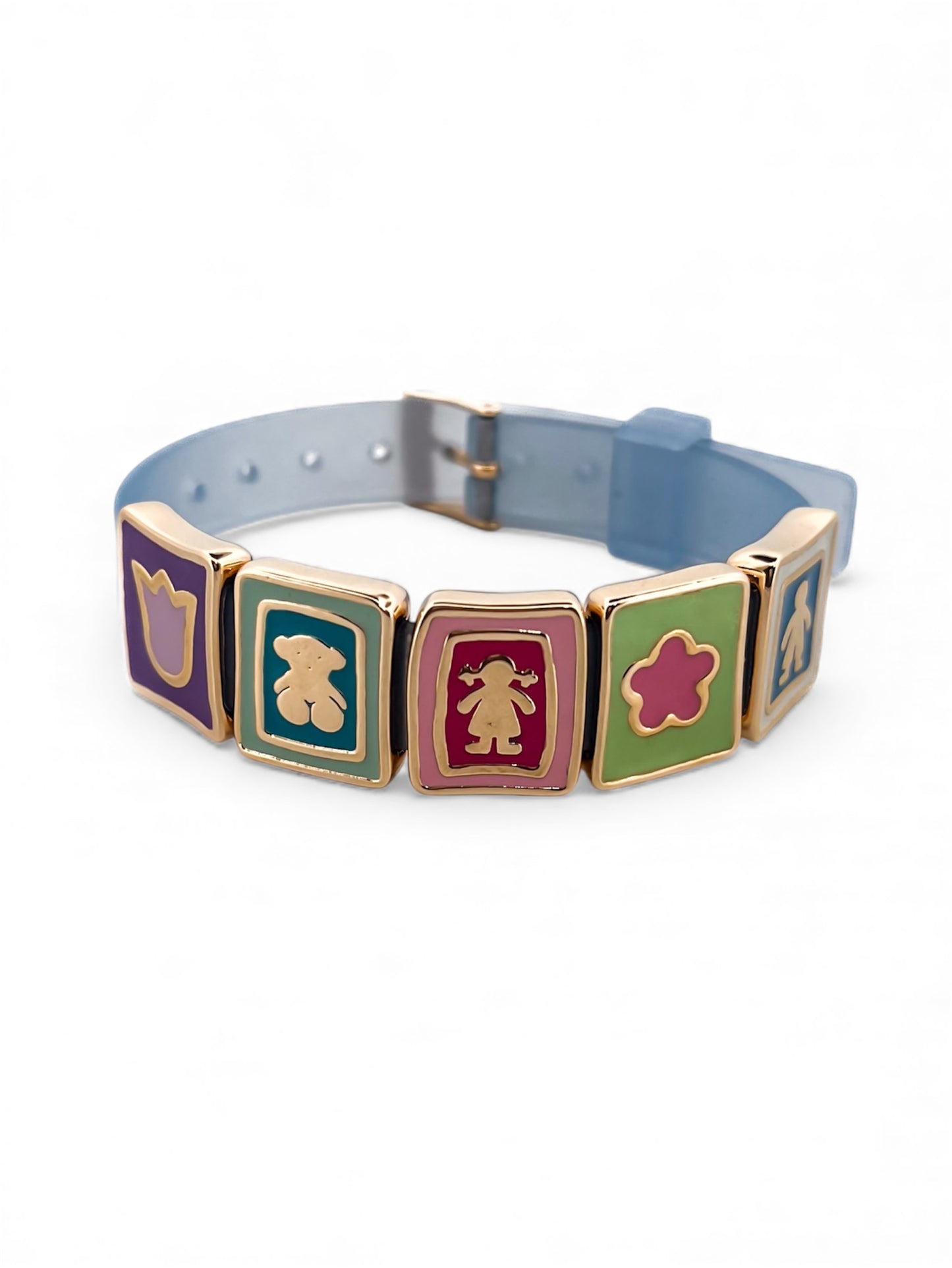 Comprar pulsera de Tous realizada en caucho y con quadrados en el centro realizados en oro amarillo con diferentes dibujos en cada uno. Joyas de Tous de oro descatalogadas al mejor precio
