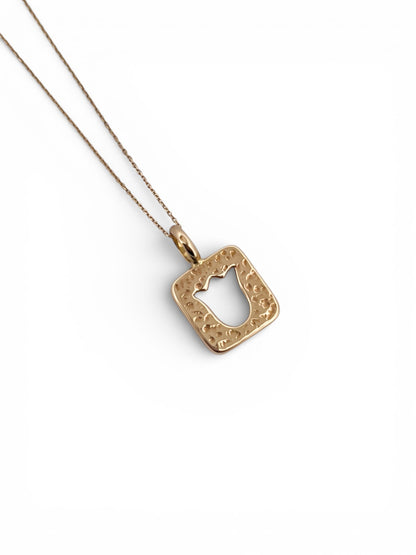 Comprar colgante de la firma TOUS en forma de tulipan realizado en oro amarillo de 18kt.Tous en oro amarillo de 18kt. Venta de joyas Tous segunda mano. Ian'Or.