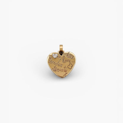 Comprar colgante de la firma TOUS en forma de corazón realizado en oro amarillo de 18kt con un pequeño corazón de diamante en la esquina.Tous en oro amarillo de 18kt. Venta de joyas Tous segunda mano. Ian'Or.