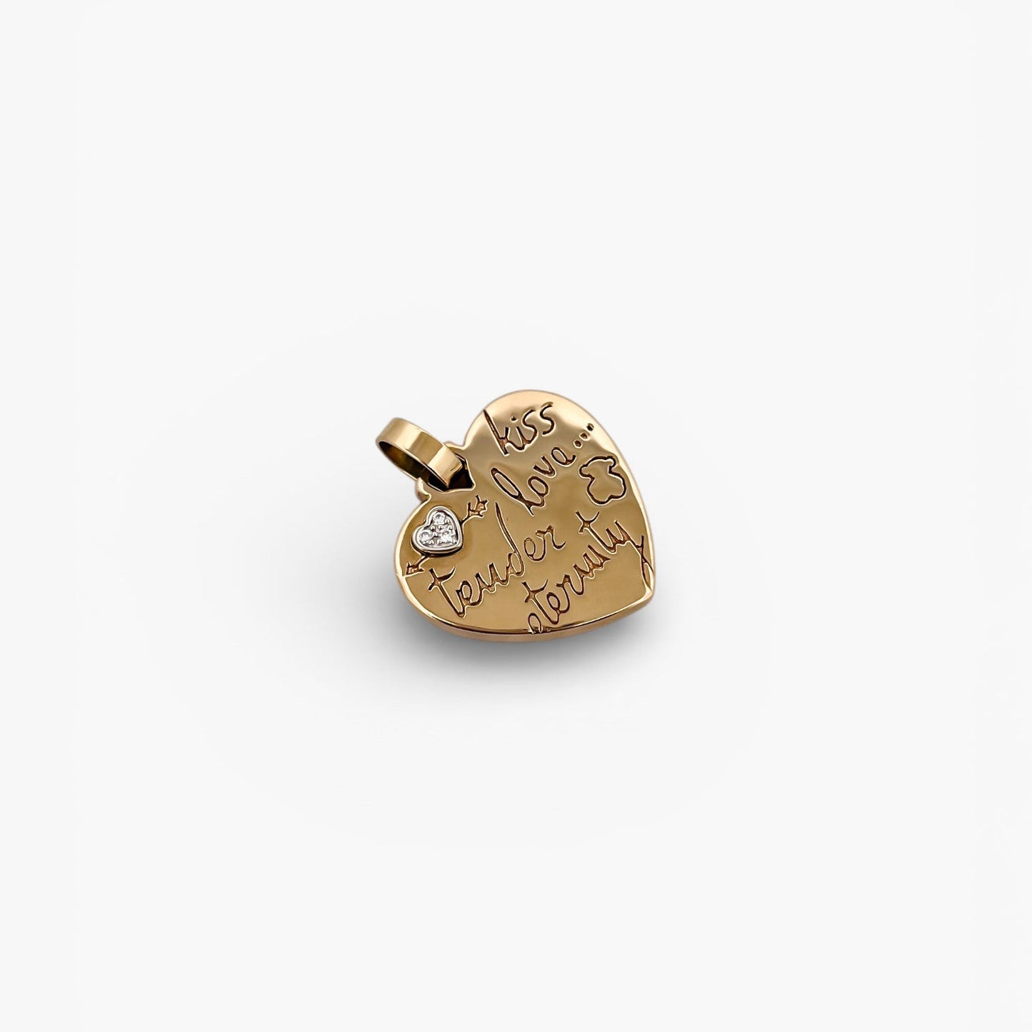 Comprar colgante de la firma TOUS en forma de corazón realizado en oro amarillo de 18kt con un pequeño corazón de diamante en la esquina.Tous en oro amarillo de 18kt. Venta de joyas Tous segunda mano. Ian'Or.