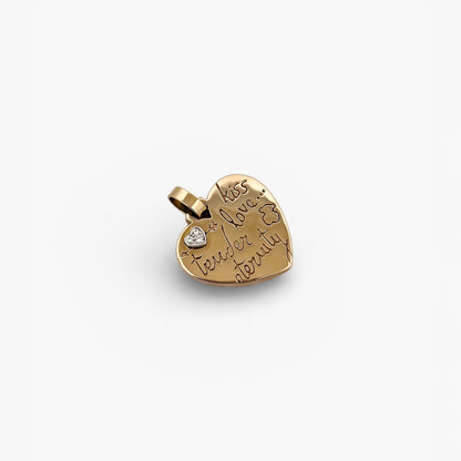 Comprar colgante de la firma TOUS en forma de corazón realizado en oro amarillo de 18kt con un pequeño corazón de diamante en la esquina.Tous en oro amarillo de 18kt. Venta de joyas Tous segunda mano. Ian'Or.