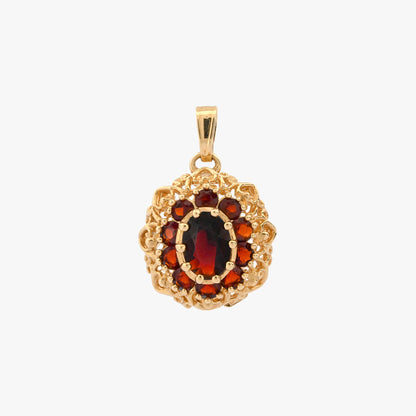 Comprar Colgante realizado en oro amarillo de 18kt con 10 granates, alrededor de un granate central. Joyería Barata en Barcelona.