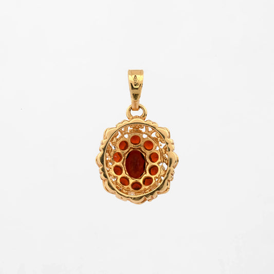 Comprar Colgante realizado en oro amarillo de 18kt con 10 granates, alrededor de un granate central. Joyería Barata en Barcelona.