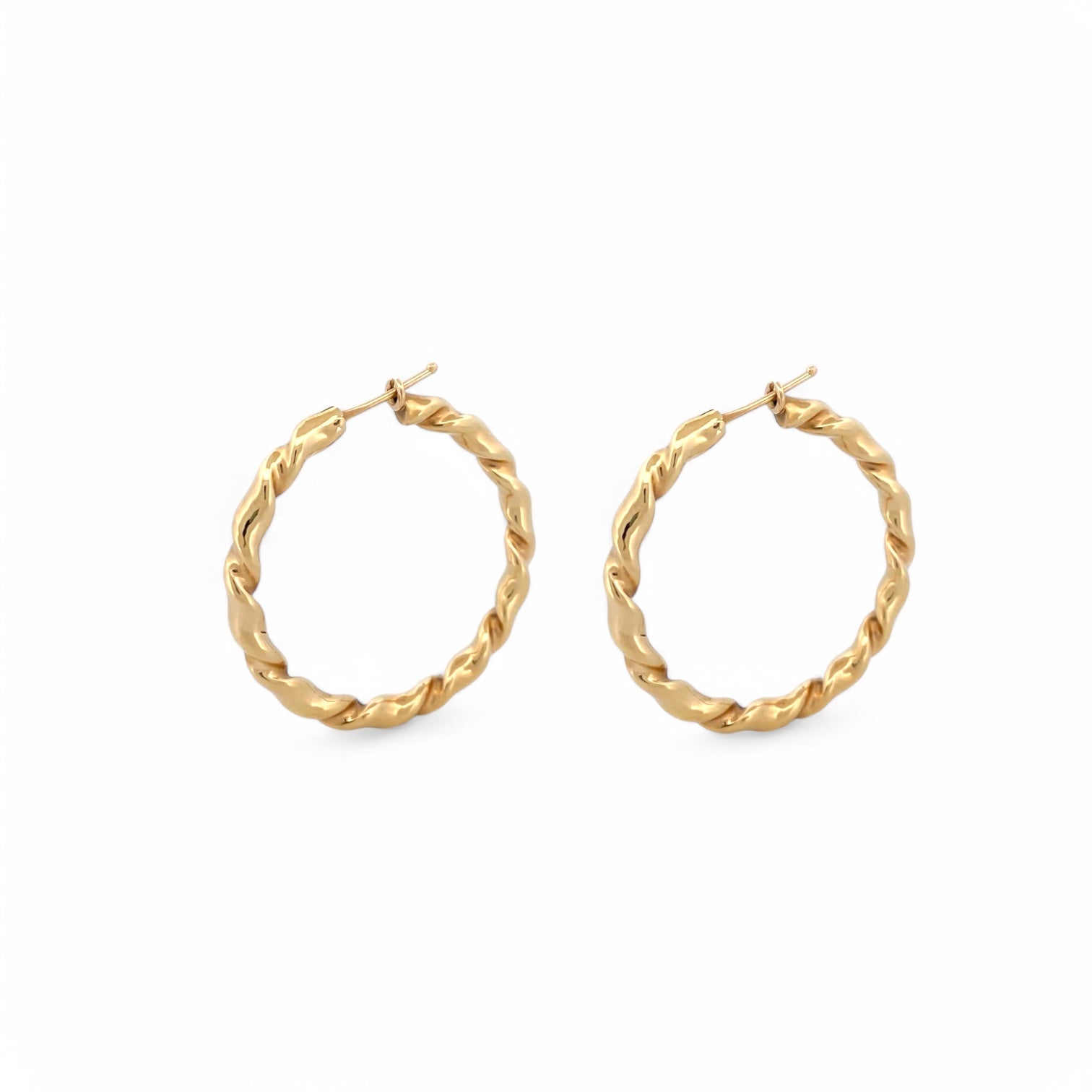 Comprar pendientes aro en espiral irregular de oro amarillo de 18kt de 3,5cm de diámetro. Cierre tipo criolla. Pendientes oro de 18kt baratos. Joyería Ian'Or. 