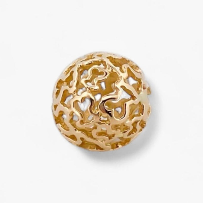 Comprar colgante en forma de bola hueca con la silueta de los icónicos ositos de la firma Tous en oro amarillo de 18kt. Venta de joyas Tous segunda mano.