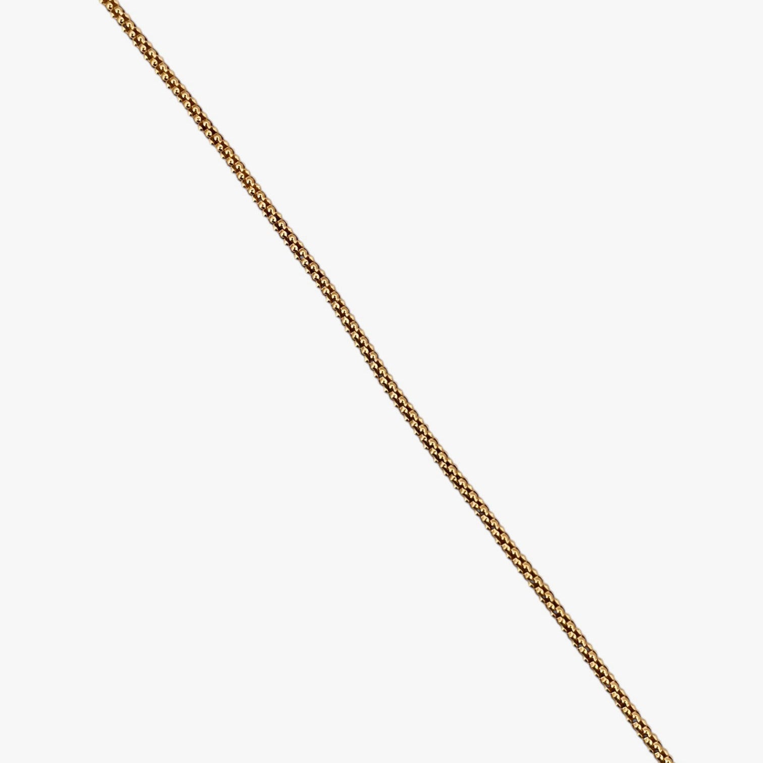 Comprar collar de oro amarillo de 18kt con cadena de cordón malla redonda. La cadena mide 45,5cm de largo y dispone de un cierre tipo mosquetón. Joyería Ian'Or. Envío GRATIS.