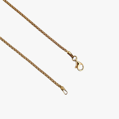 Comprar collar de oro amarillo de 18kt con cadena de cordón malla redonda. La cadena mide 45,5cm de largo y dispone de un cierre tipo mosquetón. Joyería Ian'Or. Envío GRATIS.