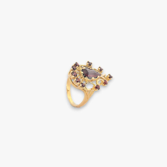 Comprar Sortija en forma de gota realizada en oro amarillo de 18kt y 11 granates. Joyas vintage. Joyas de segunda mano. Joyería Ian'Or.