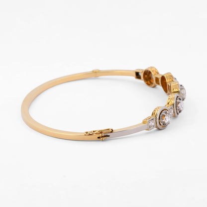 Comprar pulsera esclava Art Deco realizada en oro amarillo de 18kt y platino con diamantes talla antigua a lo largo de la pulsera. Ian'Or. vintage