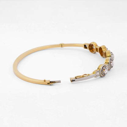 Comprar pulsera esclava Art Deco realizada en oro amarillo de 18kt y platino con diamantes talla antigua a lo largo de la pulsera. Ian'Or. vintage
