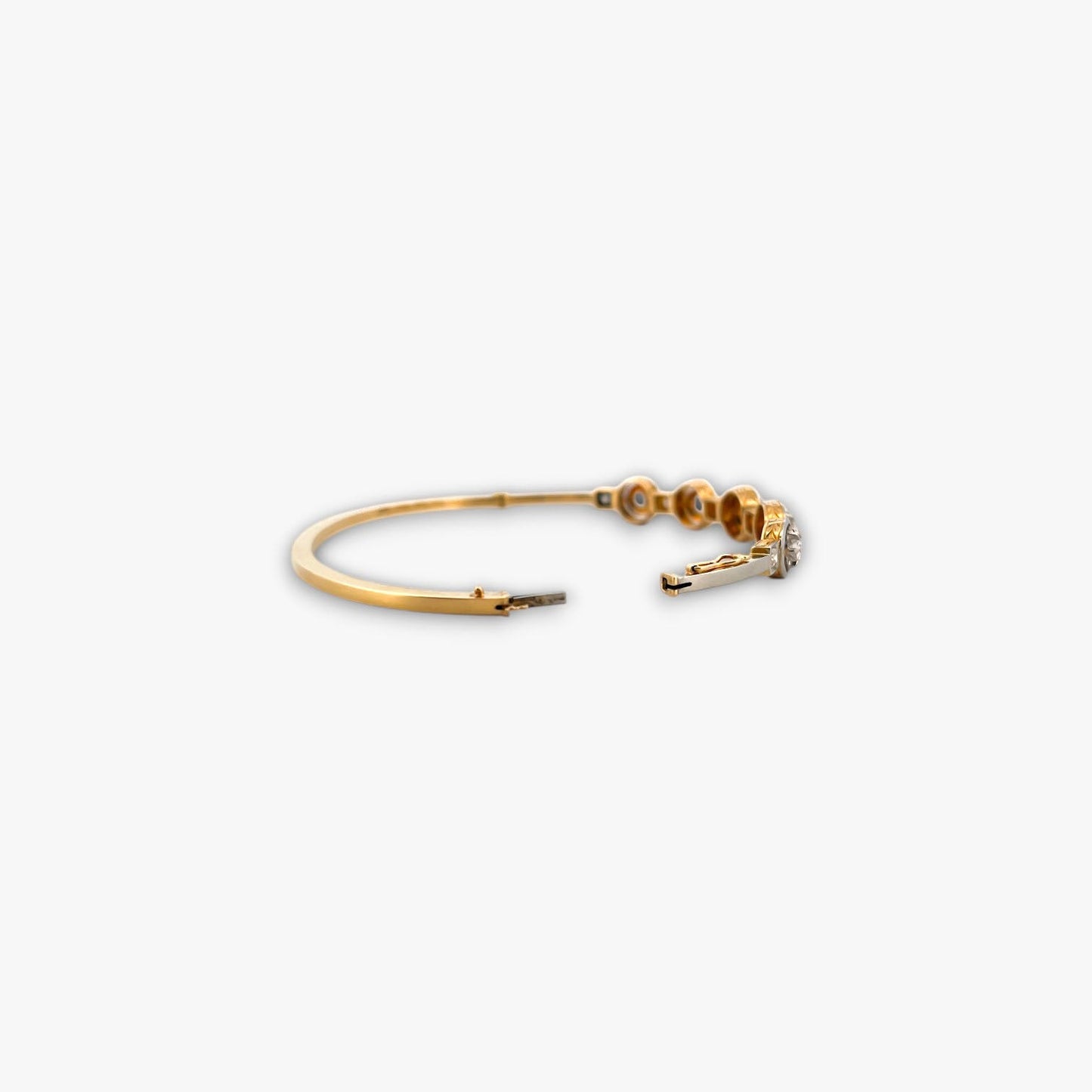 Comprar pulsera esclava Art Deco realizada en oro amarillo de 18kt y platino con diamantes talla antigua a lo largo de la pulsera. Ian'Or. vintage