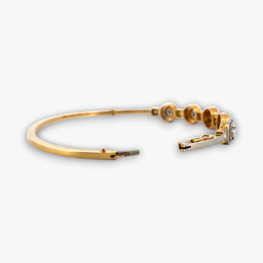Comprar pulsera esclava Art Deco realizada en oro amarillo de 18kt y platino con diamantes talla antigua a lo largo de la pulsera. Ian'Or. vintage