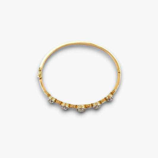 Comprar pulsera esclava Art Deco realizada en oro amarillo de 18kt y platino con diamantes talla antigua a lo largo de la pulsera. Ian'Or. vintage