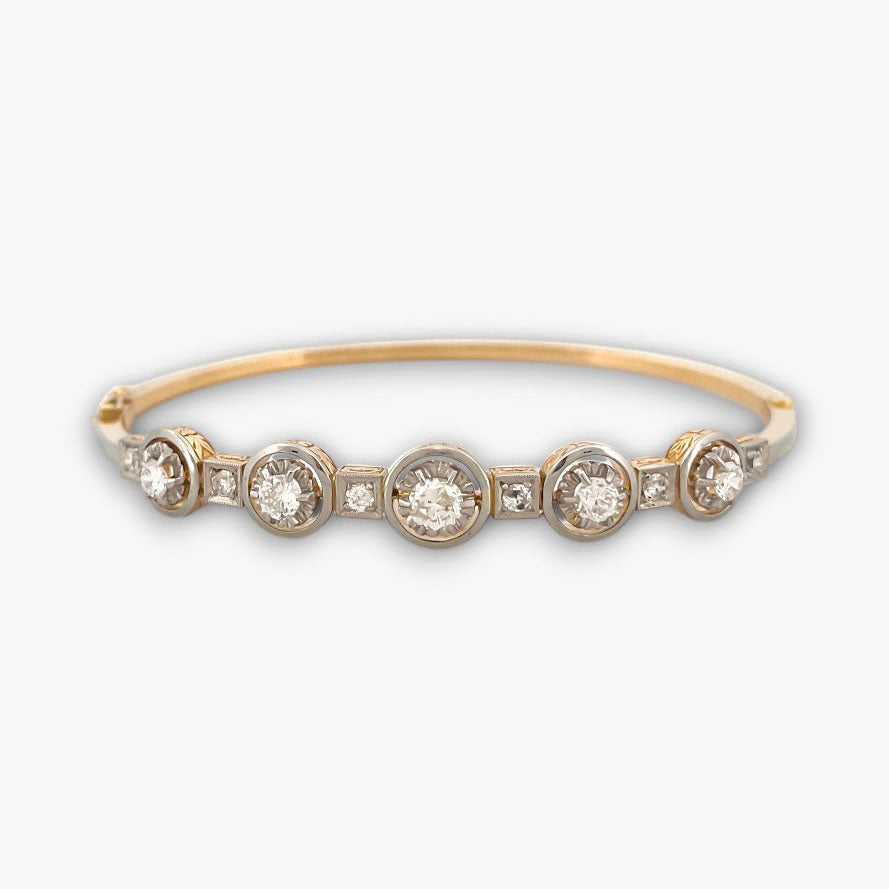 Comprar pulsera esclava Art Deco realizada en oro amarillo de 18kt y platino con diamantes talla antigua a lo largo de la pulsera. Ian'Or. vintage