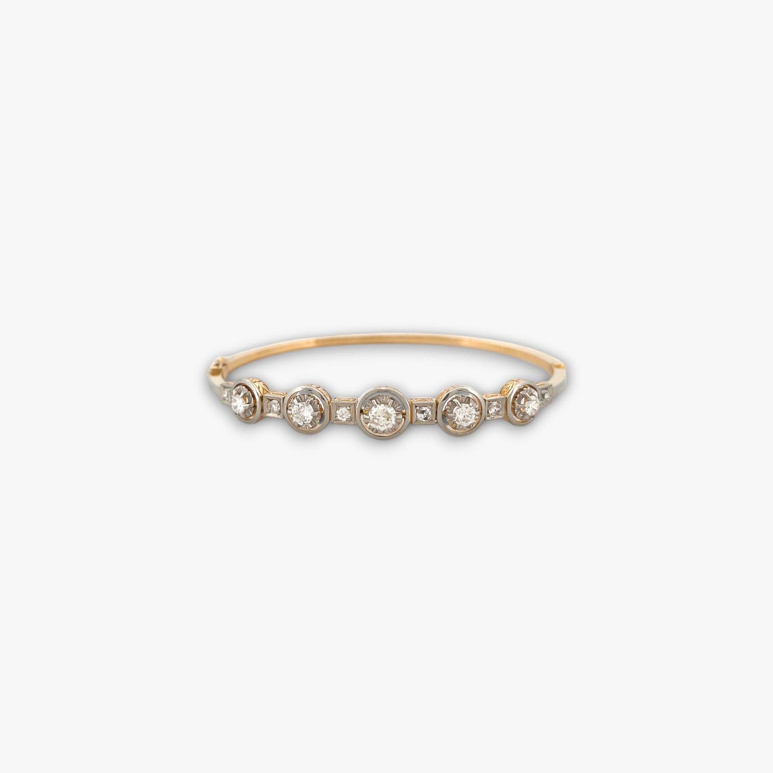 Comprar pulsera esclava Art Deco realizada en oro amarillo de 18kt y platino con diamantes talla antigua a lo largo de la pulsera. Ian'Or. vintage