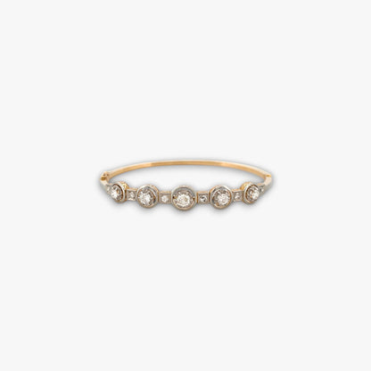 Comprar pulsera esclava Art Deco realizada en oro amarillo de 18kt y platino con diamantes talla antigua a lo largo de la pulsera. Ian'Or. vintage