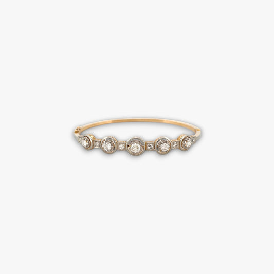 Comprar pulsera esclava Art Deco realizada en oro amarillo de 18kt y platino con diamantes talla antigua a lo largo de la pulsera. Ian'Or. vintage