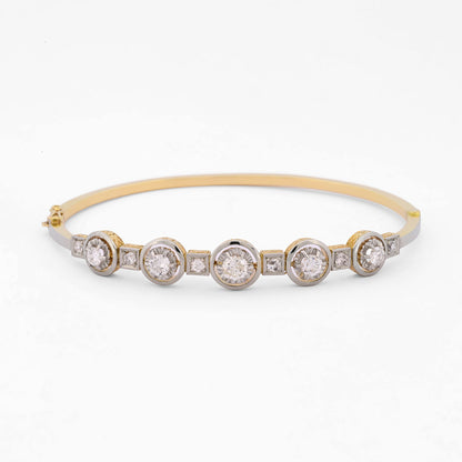 Comprar pulsera esclava Art Deco realizada en oro amarillo de 18kt y platino con diamantes talla antigua a lo largo de la pulsera. Ian'Or. vintage