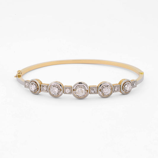Comprar pulsera esclava Art Deco realizada en oro amarillo de 18kt y platino con diamantes talla antigua a lo largo de la pulsera. Ian'Or. vintage