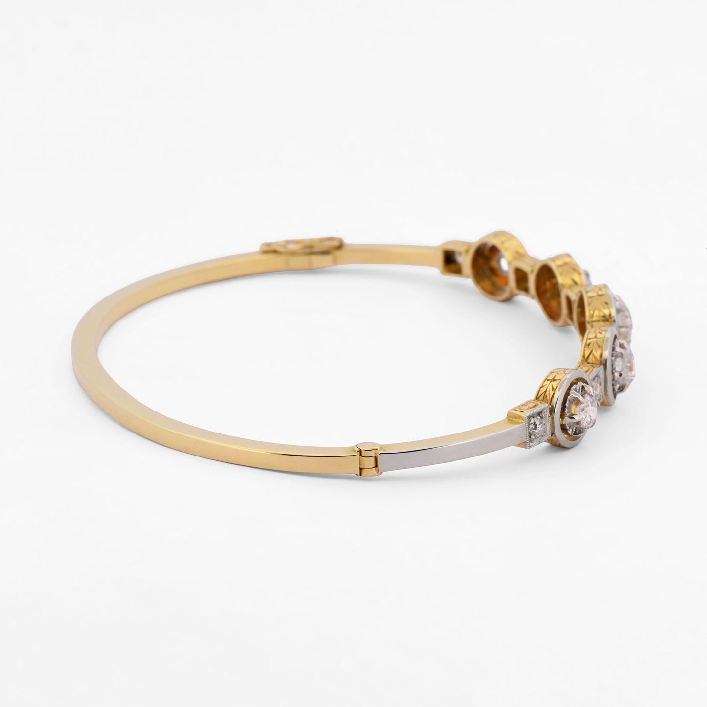 Comprar pulsera esclava Art Deco realizada en oro amarillo de 18kt y platino con diamantes talla antigua a lo largo de la pulsera. Ian'Or. vintage