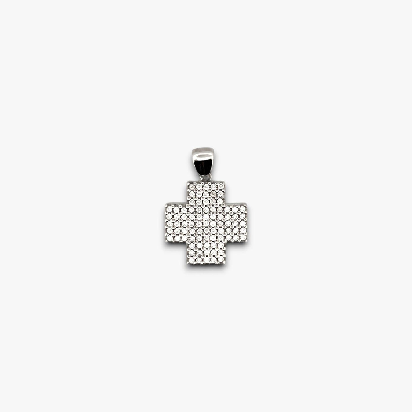Cruz realizada en oro blanco y diamantes talla brillante. Cruces religiosas . Joyería Compro Oro Barcelona. Ian'Or.