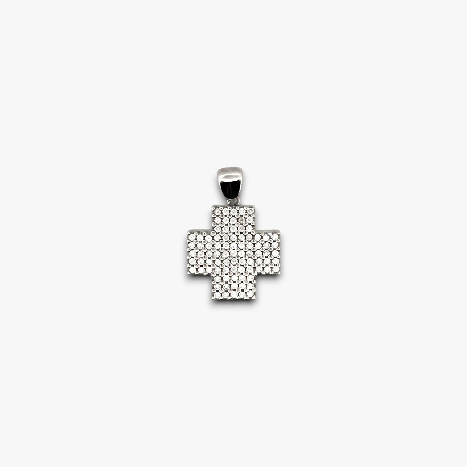 Cruz realizada en oro blanco y diamantes talla brillante. Cruces religiosas . Joyería Compro Oro Barcelona. Ian'Or.