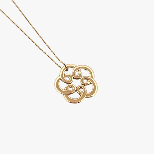 Comprar colgante de oro amarillo de 18kt en forma de flor de la iconica marca de Tous. Un must imprescindible en tu joyero si eres amante de la Firma. Pieza original.