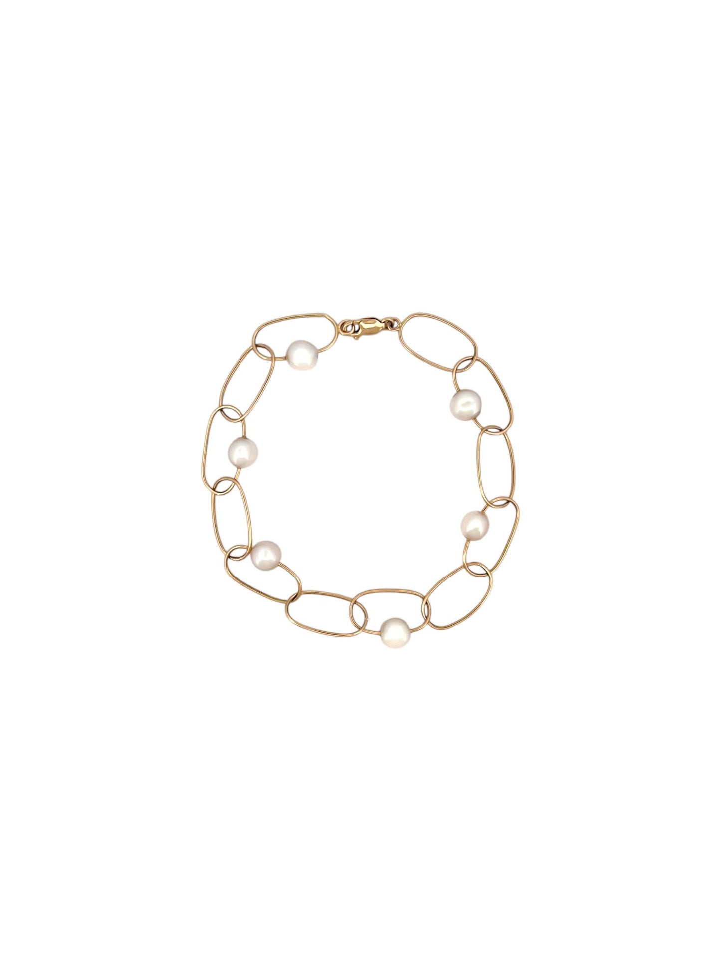 comprar pulsera de&nbsp;Oro amarillo de 18kt con seis perlas y cierre tipo mosquetón. La pulsera mide 22,5cm de largo.