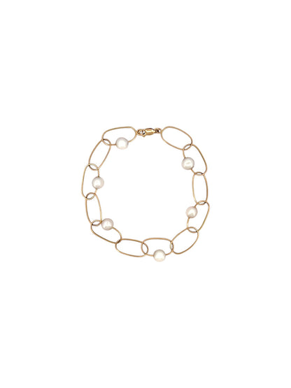 comprar pulsera de&nbsp;Oro amarillo de 18kt con seis perlas y cierre tipo mosquetón. La pulsera mide 22,5cm de largo.