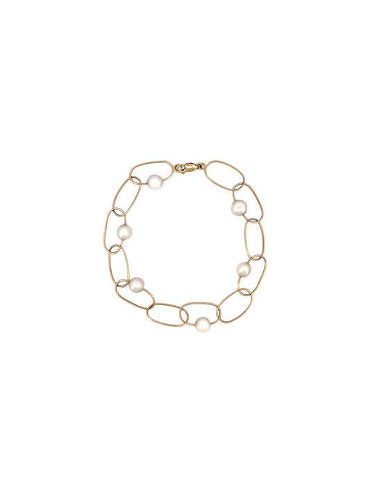 comprar pulsera de&nbsp;Oro amarillo de 18kt con seis perlas y cierre tipo mosquetón. La pulsera mide 22,5cm de largo.