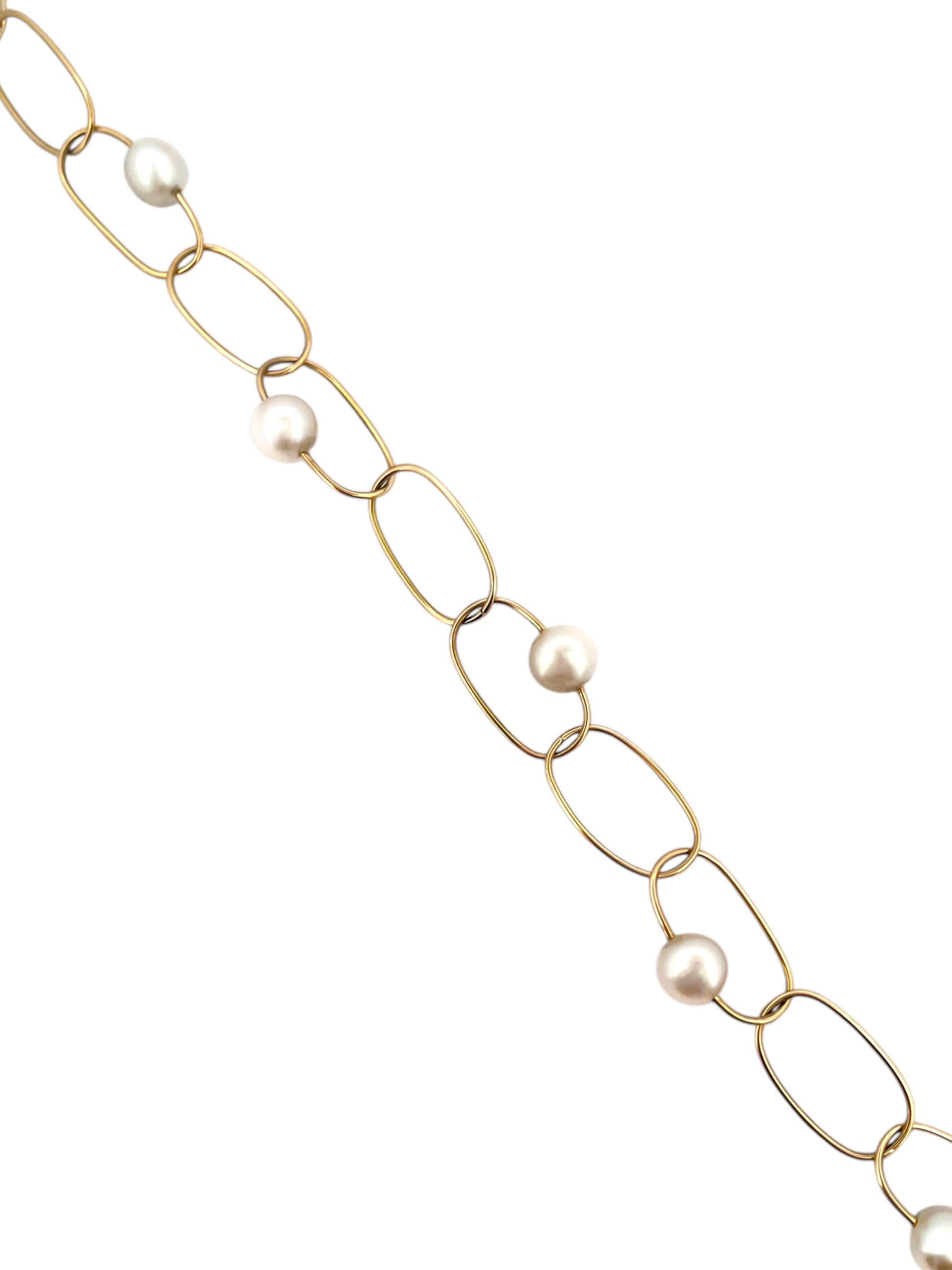 comprar pulsera de&nbsp;Oro amarillo de 18kt con seis perlas y cierre tipo mosquetón. La pulsera mide 22,5cm de largo.
