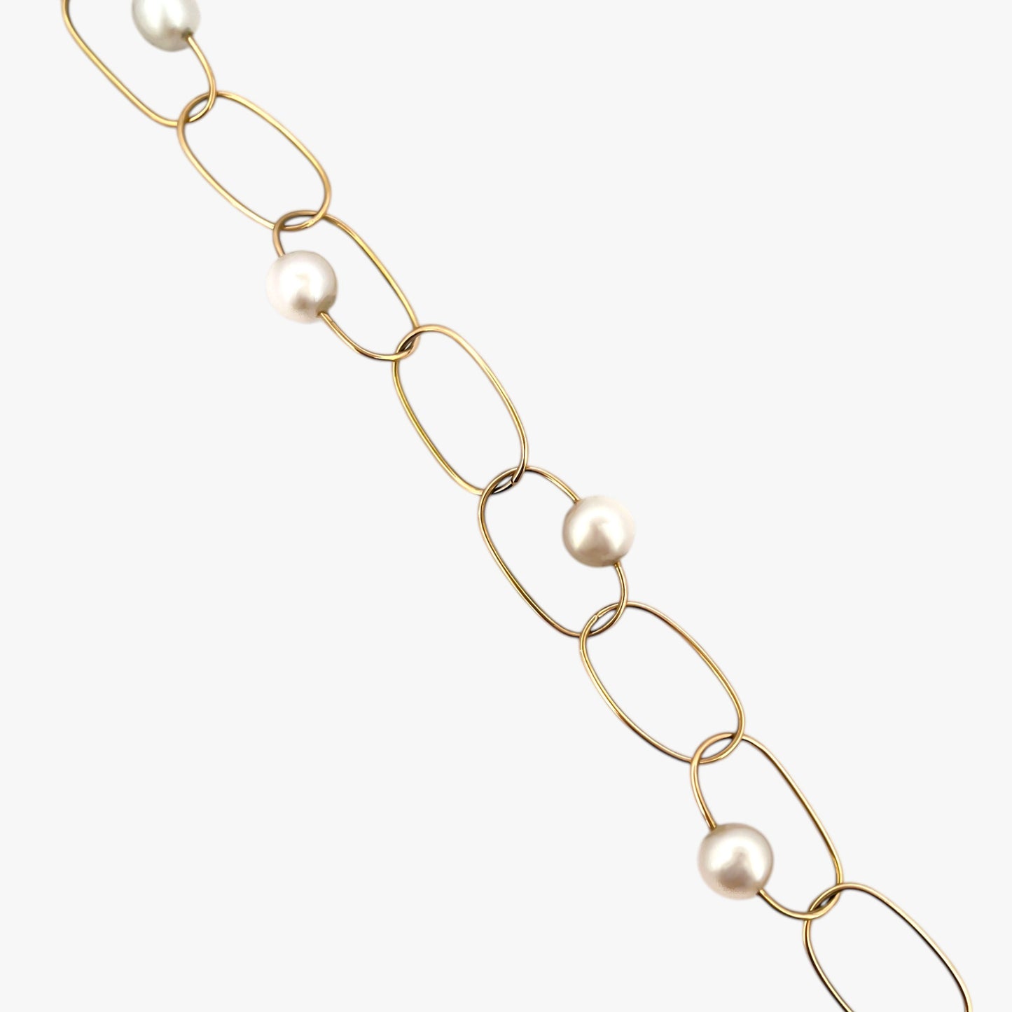 comprar pulsera de Oro amarillo de 18kt con seis perlas y cierre tipo mosquetón. La pulsera mide 22,5cm de largo.