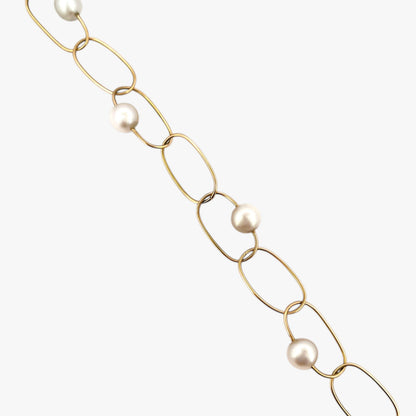 comprar pulsera de Oro amarillo de 18kt con seis perlas y cierre tipo mosquetón. La pulsera mide 22,5cm de largo.