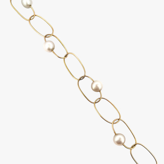 comprar pulsera de Oro amarillo de 18kt con seis perlas y cierre tipo mosquetón. La pulsera mide 22,5cm de largo.