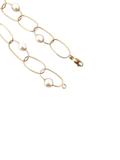 comprar pulsera de&nbsp;Oro amarillo de 18kt con seis perlas y cierre tipo mosquetón. La pulsera mide 22,5cm de largo.