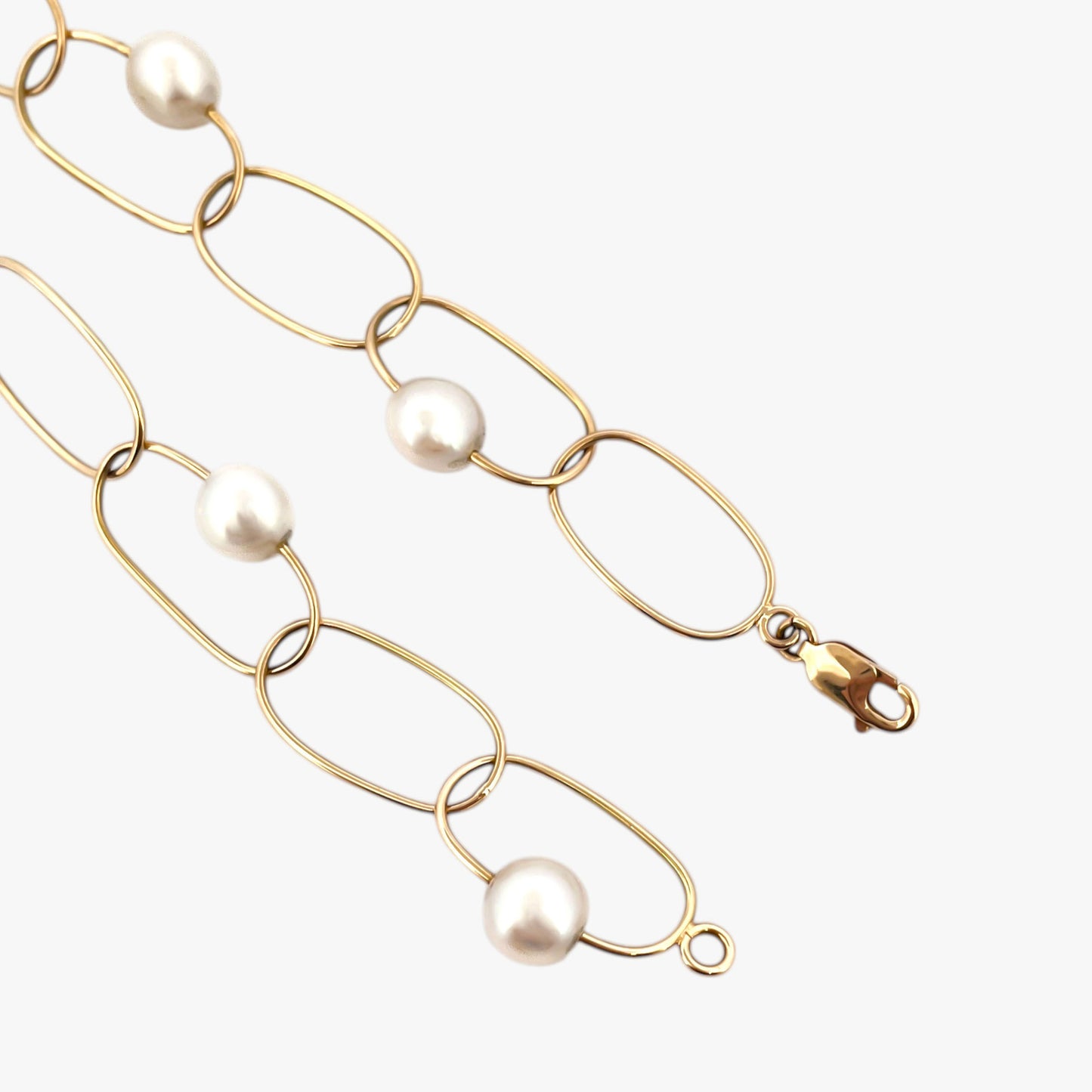 comprar pulsera de Oro amarillo de 18kt con seis perlas y cierre tipo mosquetón. La pulsera mide 22,5cm de largo.