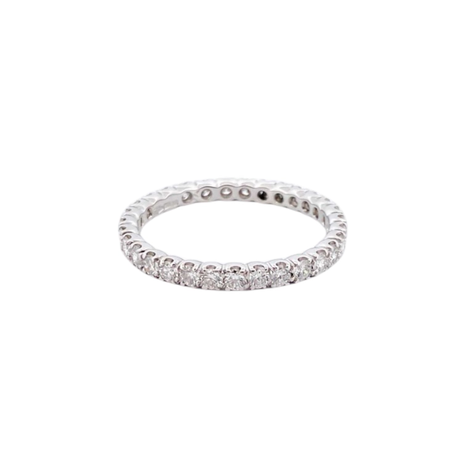Comprar alianza completa de oro blanco de 18kt con carril de diamantes talla brillante de 0,01ct cada uno. Joyas restauradas. Joyas como nuevas. Joyería Ian'Or.