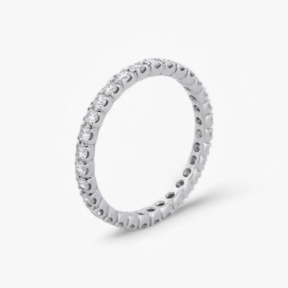 Comprar alianza completa de oro blanco de 18kt con carril de diamantes talla brillante de 0,01ct cada uno. Joyas restauradas. Joyas como nuevas. Joyería Ian'Or.