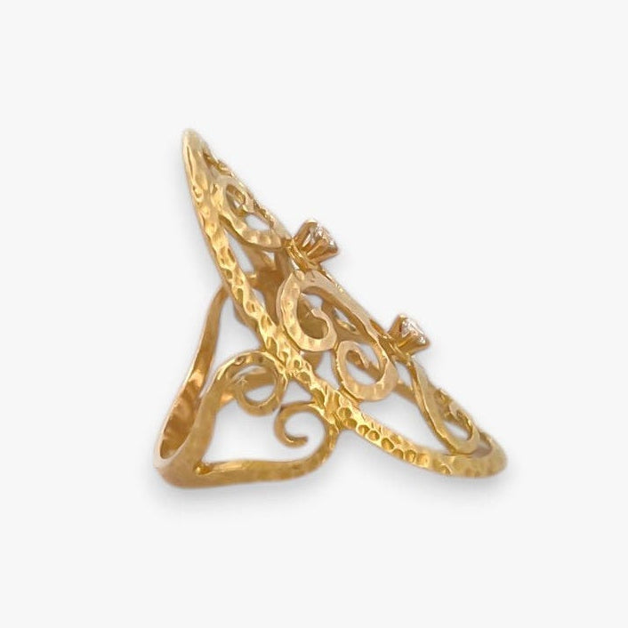 Comprar anillo original de TOUS realizado en oro amarillo de 18kt de la colección grain con 2 diamantes en la parte central. Joyas de Tous de oro baratas en Bcn.