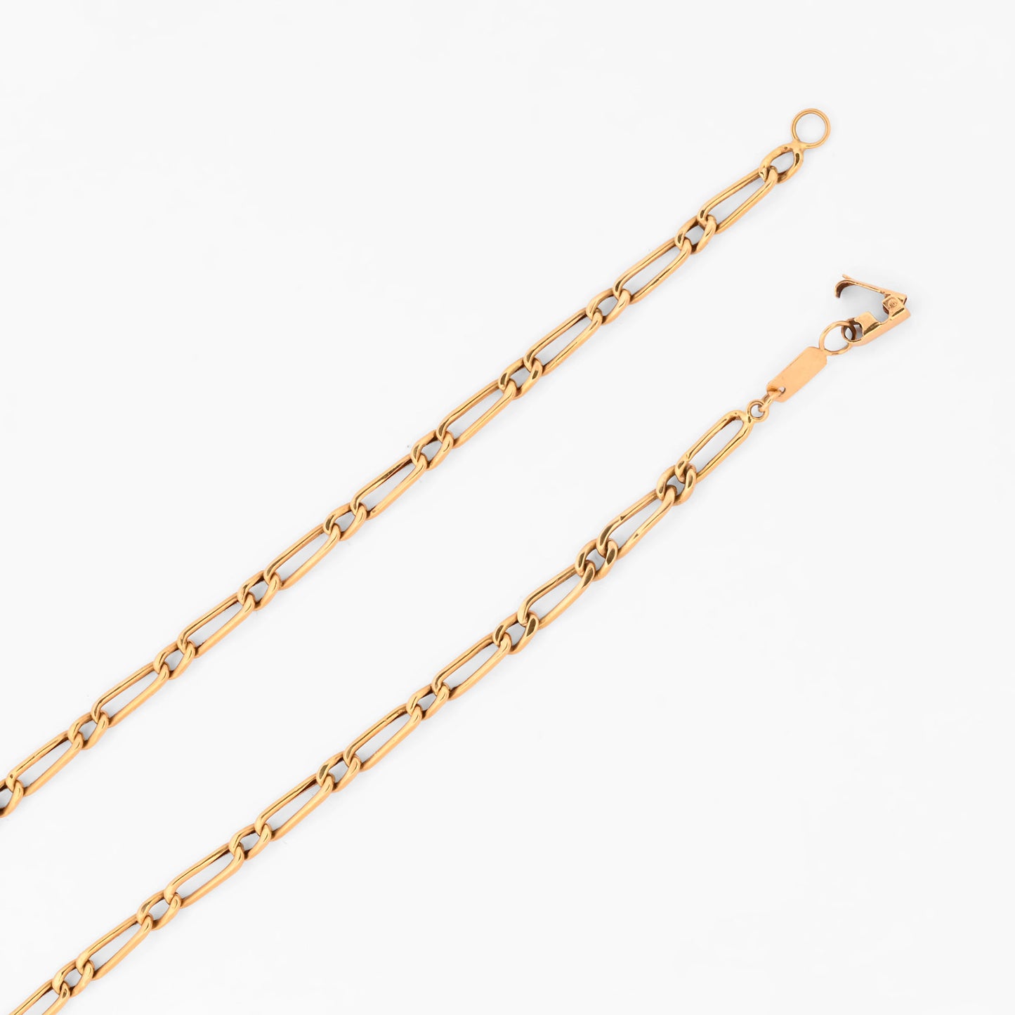 Cadena estilo Figaro de eslabones alternados de oro amarillo 18kt. Pieza equilibrada de alta resistencia y estética uniforme. Envío gratuito y pieza certificada
