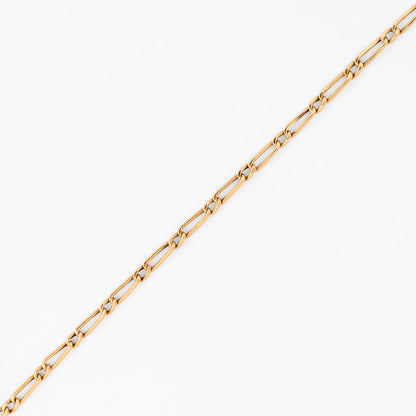 Cadena estilo Figaro de eslabones alternados de oro amarillo 18kt. Pieza equilibrada de alta resistencia y estética uniforme. Envío gratuito y pieza certificada