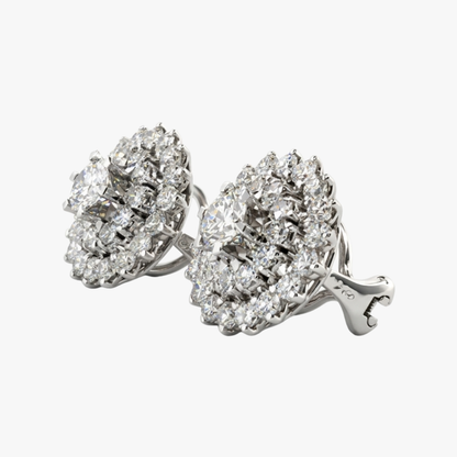 Comprar pendientes antiguos realizados en oro blanco de 18kt, con rosetón con diamante central y 30 diamantes alrededor en cada pendiente. Disponen de cierre tipo omega. Pendientes vintage oro.