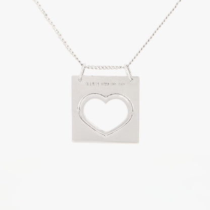 Comprar colgante de oro amarillo de 18kt en forma de rectangulo de la iconica marca de Tous. Un must imprescindible en tu joyero si eres amante de la Firma. Pieza original.