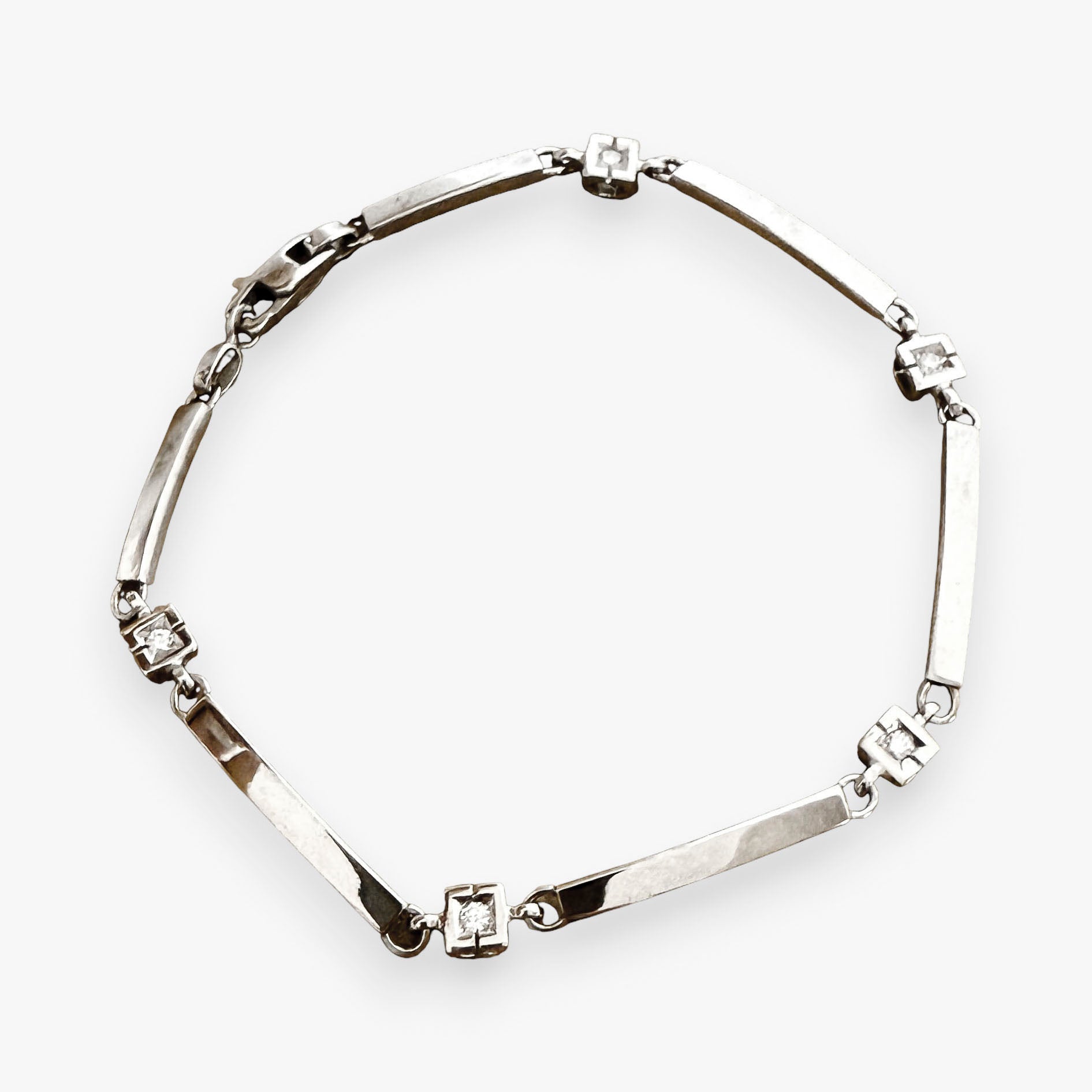 Pulsera semirrígida de Oro Blanco de 18kt con detalle de 3 eslabones. Cierre mosquetón. Joyas de segunda mano Barcelona. Joyas baratas. Ian'Or joyería.