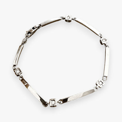 Pulsera semirrígida de Oro Blanco de 18kt con detalle de 3 eslabones. Cierre mosquetón. Joyas de segunda mano Barcelona. Joyas baratas. Ian'Or joyería.