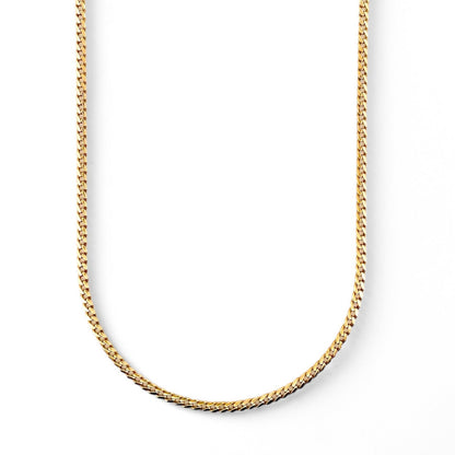 Cadena realizada en oro amarillo de 18kt con cadena barbada tipo cubana plana. Medida: 65cm de largo y cierre tipo reasa. Joya unisex. Envío gratis.