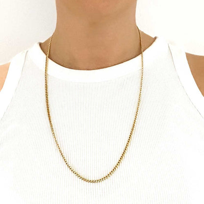 Cadena realizada en oro amarillo de 18kt con cadena barbada tipo cubana plana. Medida: 65cm de largo y cierre tipo reasa. Joya unisex. Envío gratis.