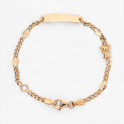 Comprar pulsera de oro amarillo de 18kt con placa central y detalle de osito. Joyeria Ian'Or. Envio gratuito, pieza certificada.