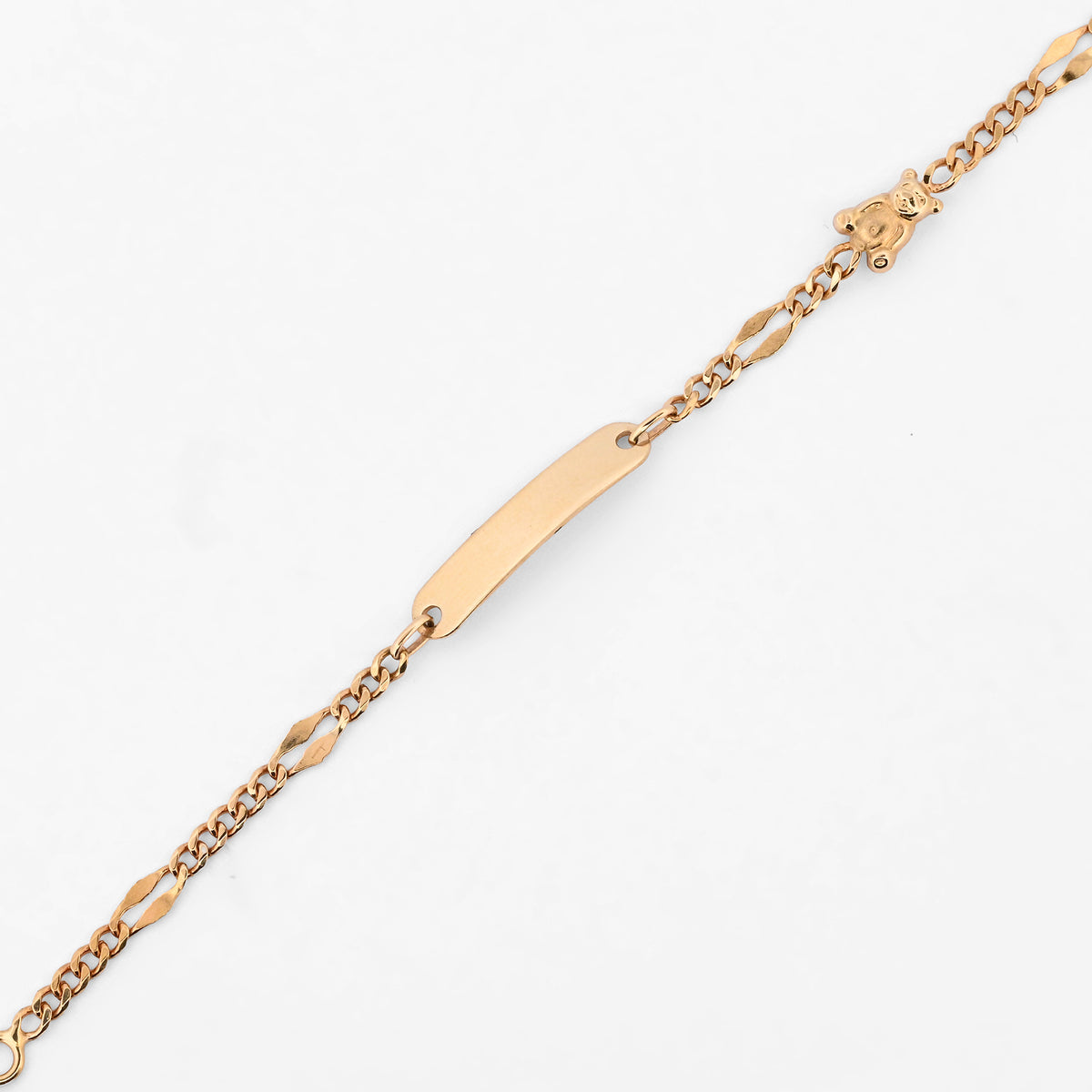 Comprar pulsera de oro amarillo de 18kt con placa central y detalle de osito. Joyeria Ian'Or. Envio gratuito, pieza certificada.