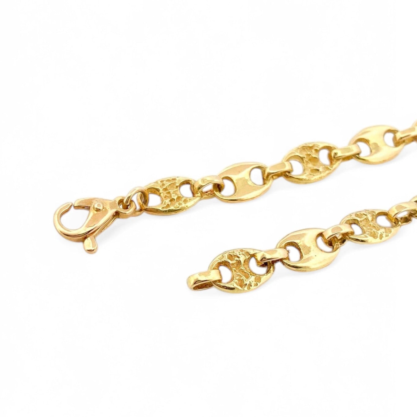 Pulsera de oro de 18kt con cadena tipo calabrote intercalada con pieza con textura y pieza lisa de 6,10mm de grosor y medida. Joyería de segunda mano restaurada Barcelona.
